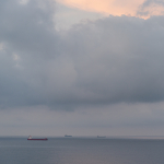 Ships at anchor in morning twilight - Livorno, Italy - August 16, 2020