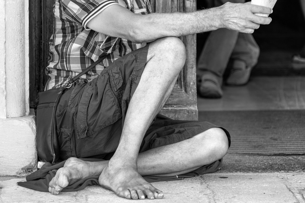 Beggar - L'Aquila, Italy - August 14, 2019
